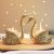 BEHOMA Aluminium Pair of Swans for Good Luck and Love | Candle Holder for Home Decor Tabletop Living Room | Showpiece for Gifting Anniversary Valentine’s Day (Candles/Plants Etc Not Included), Gold